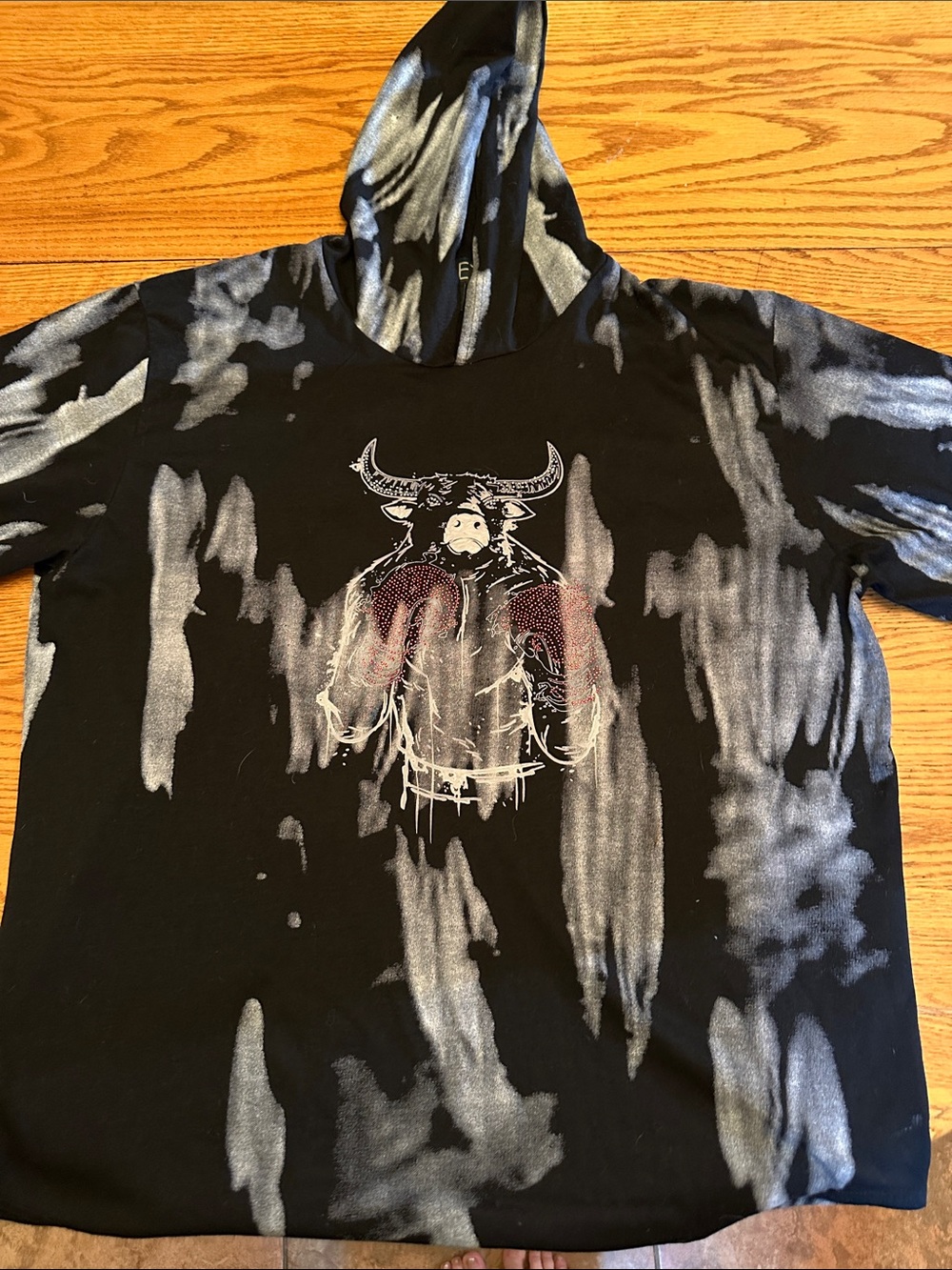Tie-Dye Black Hoodie with Buffalo Graphic